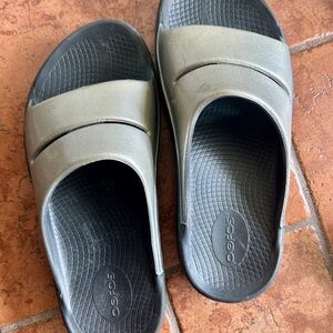 OOFOS Black and Bronze Slide Sandals